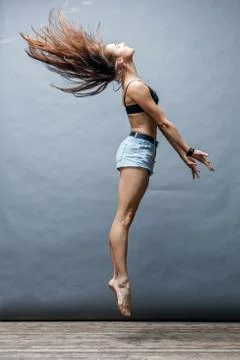 The modern ballet dancer dancing Stock Photos