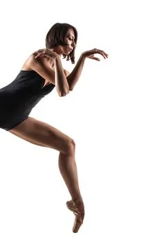 Modern ballet dancer posing on white background. Elegant lady making beautiful Stock Photos