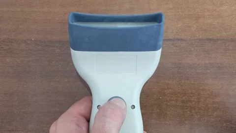 A modern bar code scanner for commerce. Working with the scanner. 動画素材 202175212