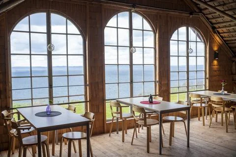 Modern Barn interior With Big Windows and Dining table Stock Photos