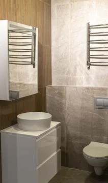 Modern Bathroom Interior with Floating White Vanity and Wood Look Tiles. In.. Stock Photos