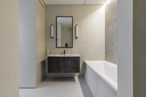 Modern Bathroom Interior View with Vanity and Bathtub Stock Photos