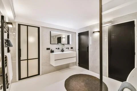 Modern bathroom with sink at mirror Stock Photos