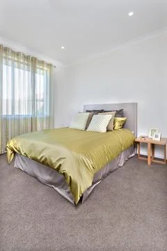 Modern bed interior with more space on the floor Stock Photos