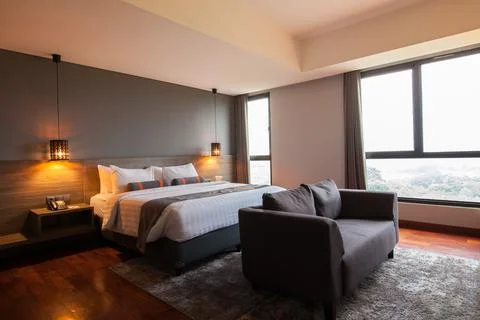 Modern bed room interior Stock Photos