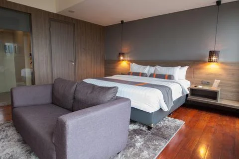 Modern bed room interior Stock Photos