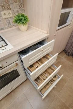 Modern beige colored kitchen Stock Photos