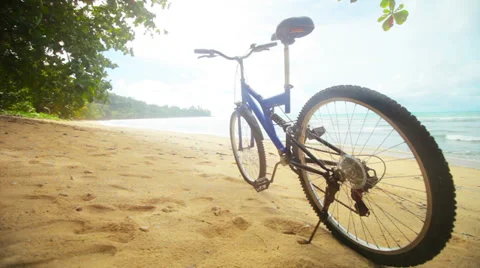 Modern bicycle on a tropical the beach without people Stock-Footage 32349246