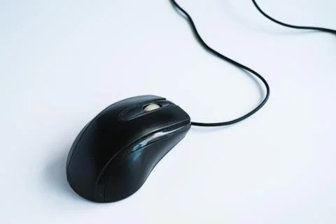 Modern black computer mouse on white background Foto stock