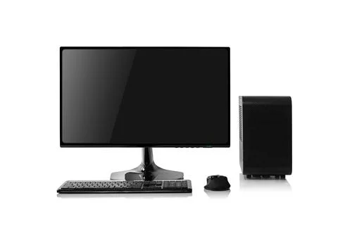 A modern black desktop computer isolated on a white background. Stock Photos