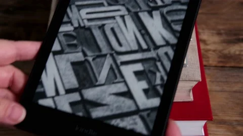 Modern black e-book reader, digital book Kindle, tablet computer device for d Video stock 164395740