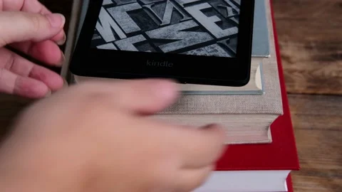 Modern black e-book reader, digital book Kindle, tablet computer device for d Video stock 164395755