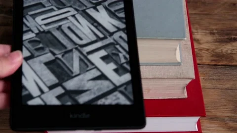 Modern black e-book reader, digital book Kindle, tablet computer device for d Video stock 164395769