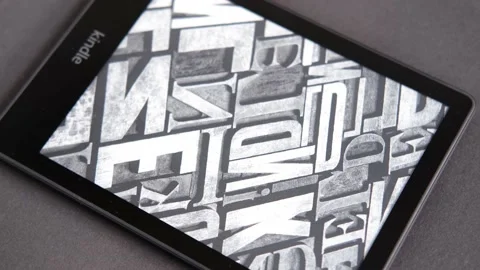 Modern black e-book reader, digital book Kindle, tablet computer device for d Video stock 164395826