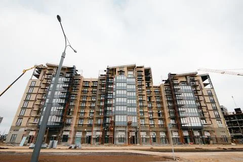 Modern black facade of a residential designed concrete apartment building. Stock Photos