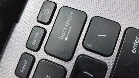 Modern black keyboard with gray surface in macro perspective Stock Photos