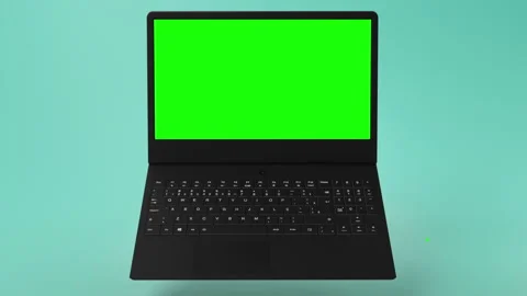 Modern, black Notebook with green screen on display for mockups or app showcases Stock Footage 254820193
