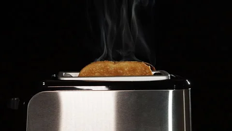 Modern black toaster with a bread. Stock Footage 122497245