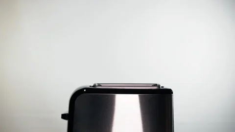 Modern black toaster with a bread. Stock Footage 125266874