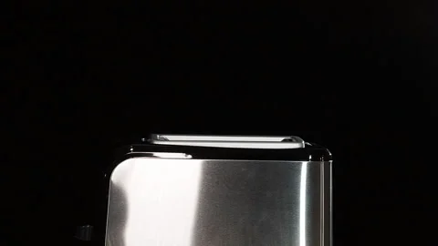 Modern black toaster with a bread. Stock Footage 127154005