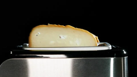 Modern black toaster with a bread. Stock Footage 128224821