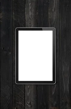 Modern blank tablet pc computer mockup on black wood desk. 3D render Stock Photos