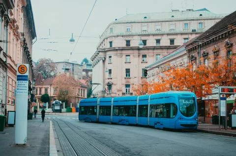 A modern blue tram of Zagreb, Croatia, stopping in the public transportation  Stock Photos