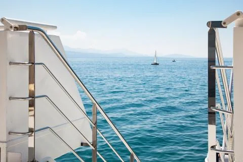 Modern boat open deck railing with view of Lake Leman (Geneva Lake) on beauti Stock Photos