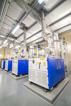 Modern boiler equipment room at a plant Stock Photos