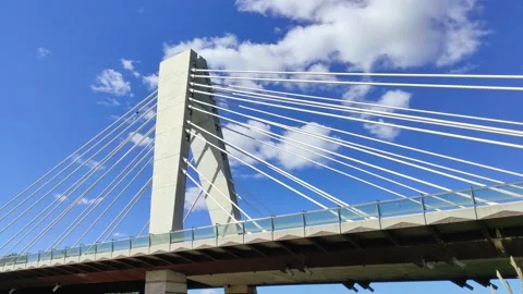 Modern bridge on the background of blue sky Stock Footage 164651855