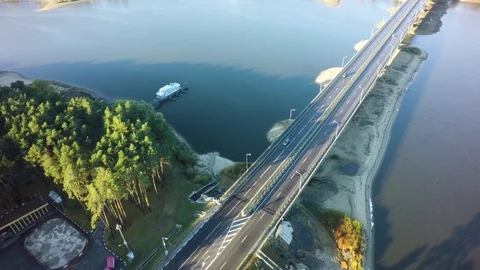 Modern bridge buildings with empty road under blue sky. Stock-Footage 95928186