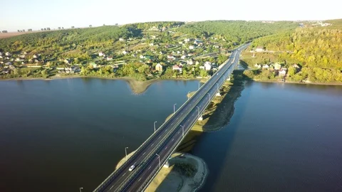 Modern bridge buildings with empty road under blue sky. Stock-Footage 95928401