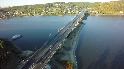 Modern bridge buildings with empty road under blue sky. 스톡 동영상 95928512