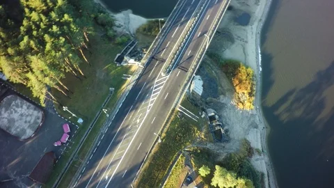 Modern bridge buildings with empty road under blue sky. 스톡 동영상 95977372