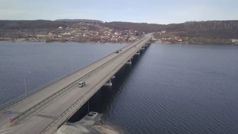 Modern bridge buildings with empty road under blue sky. Stock Footage 106440993