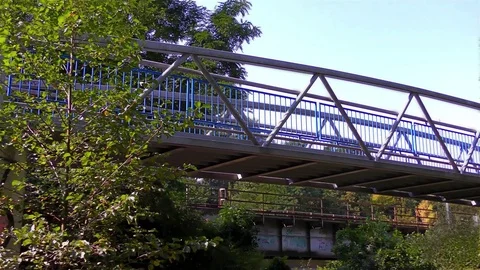 Modern Bridge on the River and Cycle Route, light fx Stockbeeldmateriaal 73198097