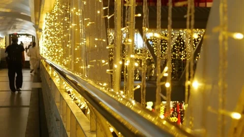 Modern Bridge Walkway with Golden String Lights Stock Footage 324902721