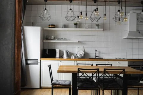 Modern, bright, clean, kitchen interior with stainless steel appliances in a Stock Photos