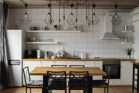 Modern, bright, clean, kitchen interior with stainless steel appliances in a Stock Photos