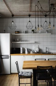 Modern, bright, clean, kitchen interior with stainless steel appliances in a Stock Photos