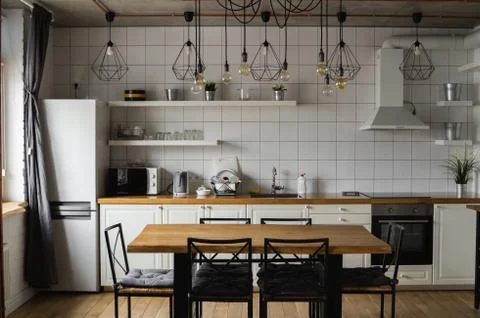 Modern, bright, clean, kitchen interior with stainless steel appliances in a Stock Photos