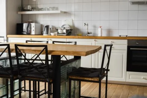 Modern, bright, clean, kitchen interior with stainless steel appliances in a Stock Photos