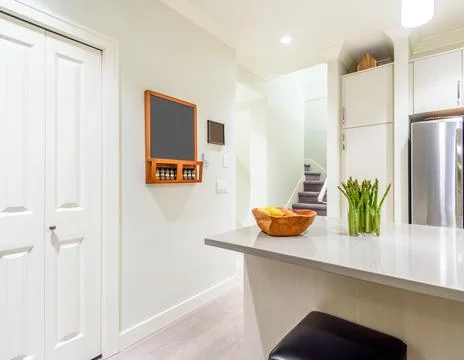 Modern, bright, clean, kitchen interior with stainless steel appliances in a  Stock Photos