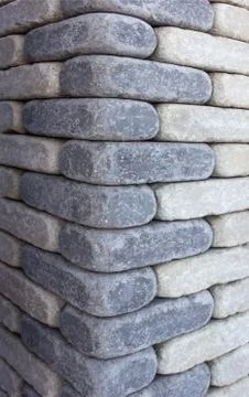 Modern brown brick column, background texture, closeup, decoration Foto stock
