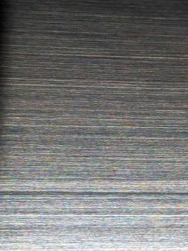 Modern Brushed Metallic Surface Displaying Gentle Shadows And Fine Grain Te.. Stock Photos