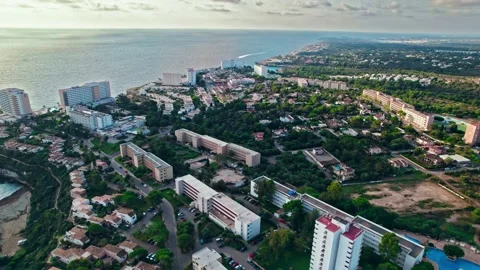 Modern build residence building with pool by the beach on rocky caves in Majorca Stock Footage 197488921