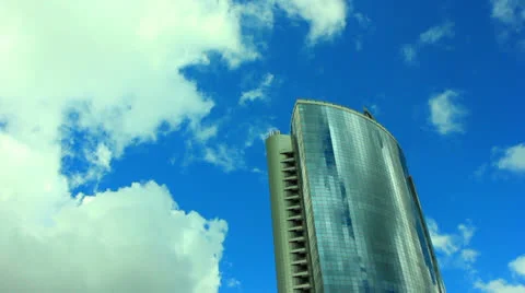 Modern building and clouds in  blue sky. Time lapse Video stock 25849333