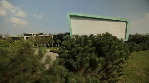 Modern building and a park area in from of it, general shot 2 Stock Footage 75986688