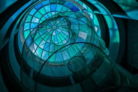 Modern building ceiling with net, abstract photography. Stock Photos