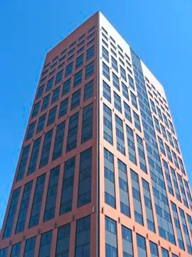 Modern building with equal windows standing in Polish city Lodz Stock Photos